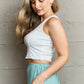 HIDDEN Bow Down Sleeveless Ruffle Crop Top